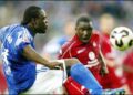 Lucien Mettomo (Kaiserlautern) facing Asamoah (Schalke 04)