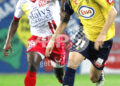 Landry NGUEMO chasing J. MENEZ (in yellow)