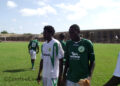 Hilaire Momi en vert et Ondobo