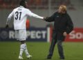 Jacques Zoua et son entraineur