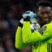 Ajax : Marc Overmars tacle André Onana
