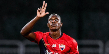 John Mary, Lions Indomptables, Chine